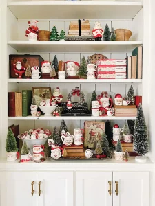 white shelves with Santa mugs bottlebrush trees and ornaments