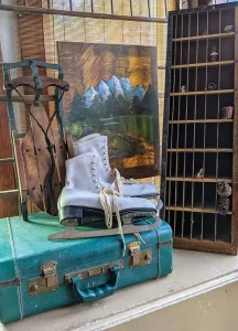 vintage ice skates sled and suitcase