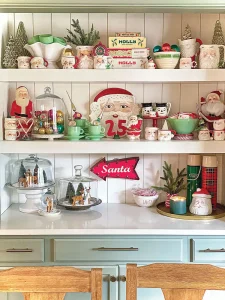 vintage holiday shelves with cloches of Shiny Brites and woodland scenes with bottlebrush trees