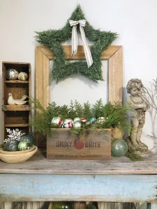 vintage Shiny Brite crate with cedars and the vintage ornaments