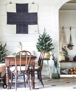 Scandinavian style decor with potted trees and sparse ornaments