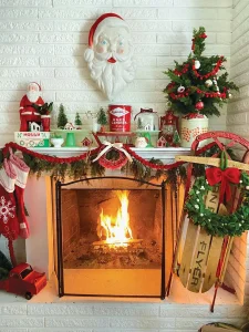 fireplace with vintage Santa head figurine mounted above mantel