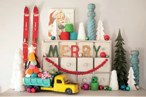 Christmas with a dash of retro decor with tree figurines, vintage Santa and classic toy truck