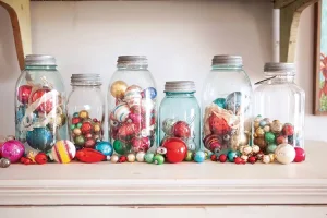 collection of ornaments displayed in mason jars