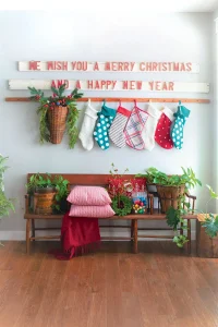 entryway with stockings and vintage bench