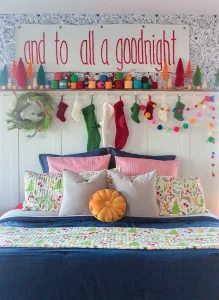 bedroom decorated for Christmas with a dash of retro with colorful bottlebrush trees, garland and bedding in vintage palette