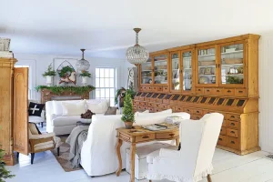 white and wood living room with natural greenery for holiday decor