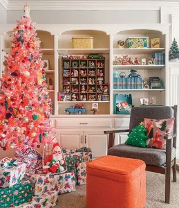 bright notes of nostalgia with pink faux tree, colorful wrapping paper and toy cars