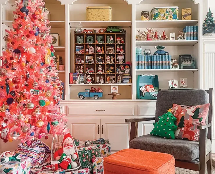 bright notes of nostalgia with pink faux tree, colorful wrapping paper and toy cars