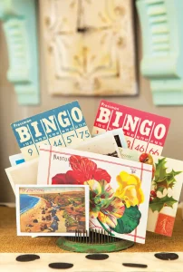 vintage comb showcasing vintage postcards and bingo cards