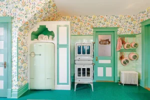 kitchen with vintage appliaces and green and floral accents
