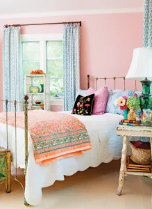 garden-inspired decor in bedroom with floral bedspread and pillow